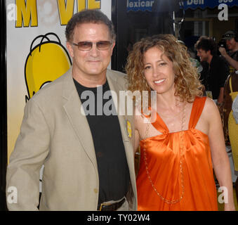 Albert Brooks, the voice of Russ Cargill in the animated motion picture comedy 'The Simpsons Movie,' arrives with his wife Kimberly Shlain at the premiere of the film in the Westwood section of Los Angeles on July 24, 2007. (UPI Photo/Jim Ruymen) Stock Photo