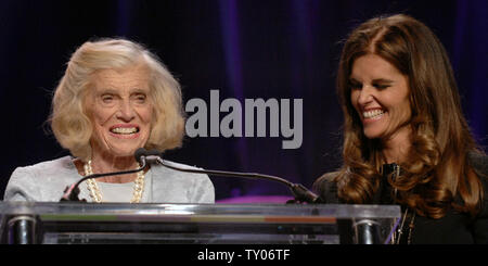 Eunice Kennedy Shriver (L), founder of the Special Olympics accepts the Lifetime Achievement Award at The Women's Conference 2007 in Long Beach, California on October 23, 2007. Looking on at right is her daughter, California first lady Maria Shriver.  (UPI Photo/Jim Ruymen) Stock Photo