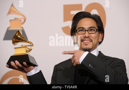 Masaki Koike holds his Grammy for Best Boxed or Special Limited 