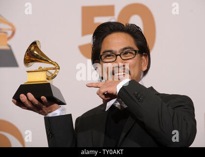 Masaki Koike holds his Grammy for Best Boxed or Special Limited 