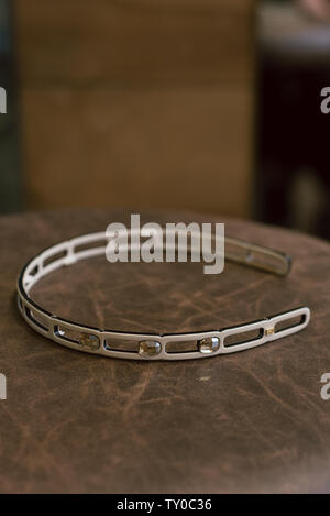 Thin hair rims lie on the surface. Fashionable and stylish head decorations for girls Stock Photo
