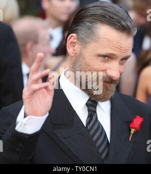 Viggo Mortensen (R), best Oscar actor nominee for 'Eastern Promises', arrives for the 80th Annual Academy Awards at the Kodak Theatre in Hollywood, California on February 24, 2008.  (UPI Photo/Terry Schmitt) Stock Photo