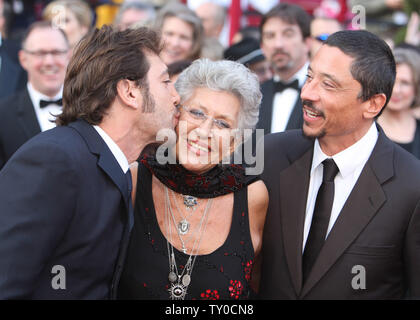 Spanish actor Javier Bardem (L) kisses his mother Pilar as his brother Carlos looks on at  the 80th Annual Academy Awards at the Kodak Theatre in Hollywood, California on February 24, 2008.  (UPI Photo/Terry Schmitt) Stock Photo