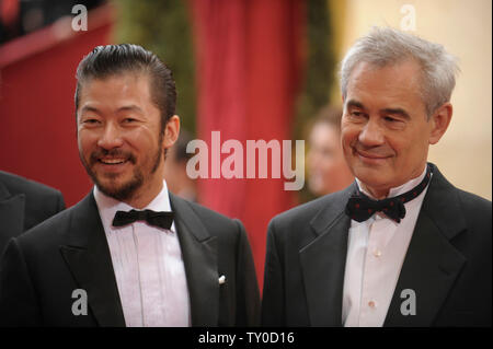 Japanese actor Tadanobu Asan (L) and Director Sergei Bodrov arrive for the 80th Annual Academy Awards at the Kodak Theatre in Hollywood, California on February 24, 2008.  (UPI Photo/Phil McCarten) Stock Photo