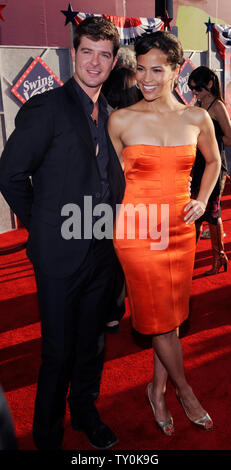 Actress Paula Patton, a cast member in the motion picture comedy 'Swing Vote', attend the premiere of the film with her husband Robin Thicke at El Capitan Theatre in the Hollywood section of Los Angeles on July 24, 2008. (UPI Photo/Jim Ruymen) Stock Photo