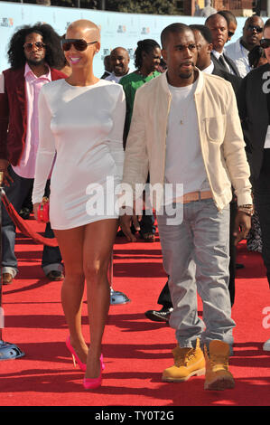 LOS ANGELES, CA. June 28, 2009: Kanye West & Amber Rose at the 2009 BET Awards (Black Entertainment Television) at the Shrine Auditorium. © 2009 Paul Smith / Featureflash Stock Photo