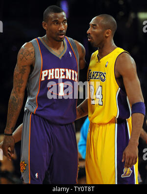 Los Angeles Lakers' Kobe Bryant (R) talks with Phoenix Suns'  Amar'e Stoudemire after the game at Staples Center in Los Angeles on December 10, 2008. The Lakers defeated the Suns 115-110.  (UPI Photo/Jon SooHoo) Stock Photo
