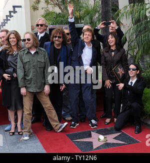 Musicians, from left, Tom Petty, Jeff Lynne, Jim Keltner, Paul McCartney and Joe Walsh join former Beatle George Harrison's widow Olivia and his son Dhani during a posthumous Hollywood Walk of Fame star dedication for Harrison in Los Angeles on April 14, 2009. (UPI Photo/Jim Ruymen) Stock Photo