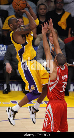 Houston Rockets Shane Battier (31), Yao Ming (11), and Rafer Alston (12 ...
