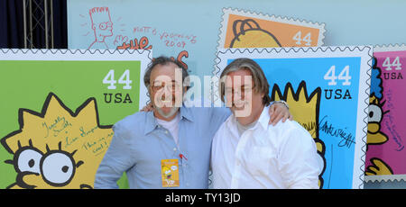 Creator and Executive Producer Matt Groening (R) and Executive Producer James L. Brooks pose for photographs at the unveiling of the new 'The Simpsons' U.S. postage stamps in Los Angeles May 7, 2009. (UPI Photo/Jim Ruymen) Stock Photo