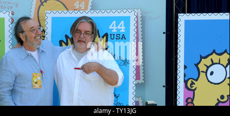 Creator and Executive Producer Matt Groening (R) and Executive Producer James L. Brooks pose for photographs at the unveiling of the new 'The Simpsons' U.S. postage stamps in Los Angeles May 7, 2009. (UPI Photo/Jim Ruymen) Stock Photo