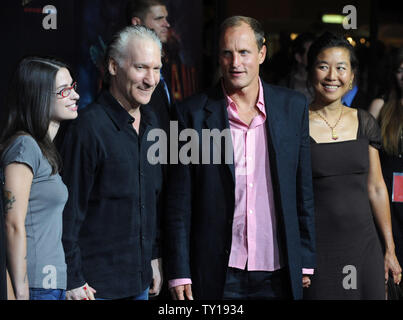 Woody Harrelson (3rd-L), a cast member in the motion picture horror comedy 'Zombieland' and his wife Laura Louie (R), attend the premiere of the film with TV political talk show host Bill Maher (2nd-L) and Cara Santa Maria (L) at Grauman's Chinese Theatre in the Hollywood section of Los Angeles on September 23, 2009.     UPI/Jim Ruymen Stock Photo