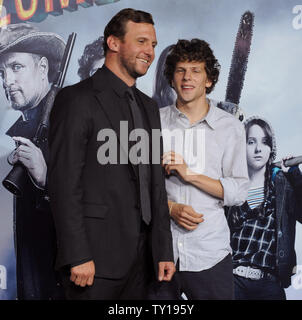 Jesse Eisenberg (R), a cast member in the motion picture horror comedy 'Zombieland', shares a moment with director Ruben Fleischer during the premiere of the film at Grauman's Chinese Theatre in the Hollywood section of Los Angeles on September 23, 2009.     UPI/Jim Ruymen Stock Photo