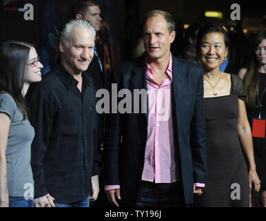 Woody Harrelson (3rd-L), a cast member in the motion picture horror comedy 'Zombieland' and his wife Laura Louie (R), attend the premiere of the film with TV political talk show host Bill Maher (2nd-L) and Cara Santa Maria (L) at Grauman's Chinese Theatre in the Hollywood section of Los Angeles on September 23, 2009.     UPI/Jim Ruymen Stock Photo