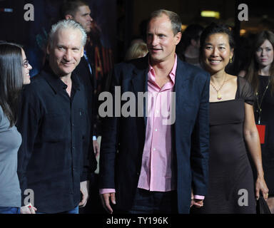 Woody Harrelson (3rd-L), a cast member in the motion picture horror comedy 'Zombieland' and his wife Laura Louie (R), attend the premiere of the film with TV political talk show host Bill Maher (2nd-L) and Cara Santa Maria (L) at Grauman's Chinese Theatre in the Hollywood section of Los Angeles on September 23, 2009.     UPI/Jim Ruymen Stock Photo