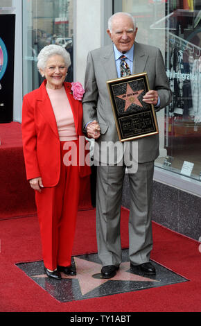 Judge Joseph A. Wapner, former host of the television series 'The People's Court', and his wife Mickey smile for photographers after Wapner was honored with the 2,392nd star during an unveiling ceremony on the Hollywood Walk of Fame in Los Angeles on November 12, 2009. Wapner turns 90 years old November 15.     UPI/Jim Ruymen Stock Photo