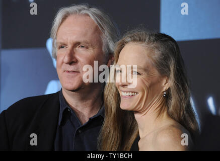 Director James Cameron (L) and wife Suzy Amis attend the premiere of the film 'Avatar' in Los Angeles on December 16, 2009.      UPI/ Phil McCarten Stock Photo