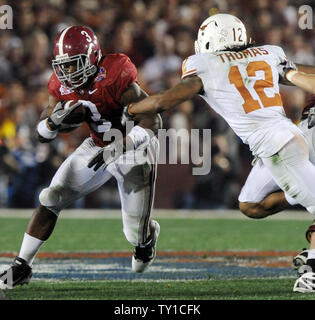 Alabama running back Trent Richardson (3) rushes for yardage as LSU ...