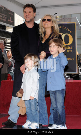 Australian actor Russell Crowe saviors the moment with his wife Danielle Spencer and their two sons Charlie Spencer Crowe (L) and Tennyson Spencer Crowe during an unveiling ceremony honoring him with the 2,404th star on the Hollywood Walk of Fame in Los Angeles on April 12, 2010.     UPI/Jim Ruymen Stock Photo