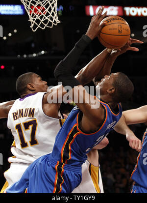 Los Angeles Lakers center Andrew Bynum (17) stops Oklahoma City Thunder forward Kevin Durant from scoring during the first half of Game 1 of their Western Conference playoff series at Staples Center in Los Ageles on April 18, 2010. The Lakers defeated the Thunder 87-79. UPI Photo/Lori Shepler Stock Photo