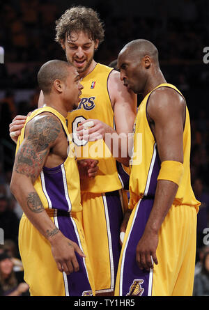 Los Angeles Lakers guard Kobe Bryant, right, and Pau Gasol, center, congratulate Shannon Brown, left, after Brown made a big dunk over the Phoenix Suns  during the first second half of Game 1 of their Western Conference Finals series at Staples Center in Los Angeles on May 17, 2010. The Lakers won 128-107 . UPI Photo/Lori Shepler Stock Photo