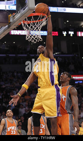 Los Angeles Lakers forward Lamar Odom makes a dunk over Phoenix Suns forward Amare Stoudemire, right, during the second half of Game 2 of their Western Conference Finals series at Staples Center in Los Angeles on May 19, 2010. The Lakers won 124-112 . UPI Photo/Lori Shepler Stock Photo