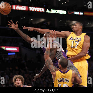 Phoenix Suns guard Jason Richardson goes up for a basket as Los Angeles Lakers guard Shannon Brown (12) and Andrew Bynum (17) defends  during the first half of Game 5 of their Western Conference Final series at Staples Center in Los Angeles on May 27, 2010. The Lakers defeated the Suns 103-101. UPI Photo/Lori Shepler Stock Photo
