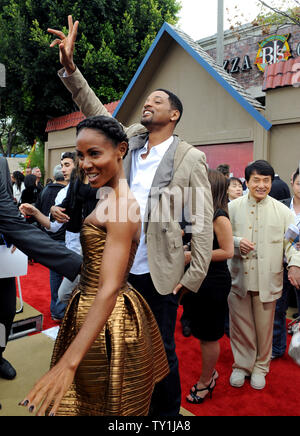 Actor Will Smith and his wife, actress Jada Pinkett Smith attend the premiere of the motion picture action drama 'The Karate Kid' in Los Angeles on June 7, 2010. Jackie Chan, who stars in the the film with Jaden Smith looks on at right. UPI/Jim Ruymen Stock Photo