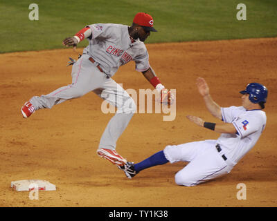 National League All Star Brandon Phillips L turns the double play as American League All Star Ian Kinsler is out at second base in the All Star Game in Anaheim California on July 13 2010