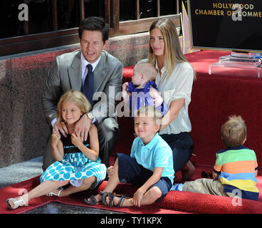 Actor Mark Wahlberg and  his wife Rhea Durham gather their children Ella, Grace, Michael and Brendan around his star during an unveiling ceremony on the Hollywood Walk of Fame in Los Angeles on July 29, 2010. Wahlberg was honored with the 2,414th star on the Walk of Fame.    UPI/Jim Ruymen Stock Photo