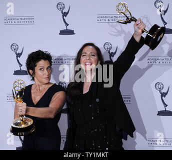 Wendy Melvoin (L) and Lisa Coleman appear backstage with the award for outstanding original main title theme music for 'Nurse Jackie'', at the Primetime Creative Arts Emmy Awards in Los Angeles on August 21, 2010.   UPI/Jim Ruymen Stock Photo