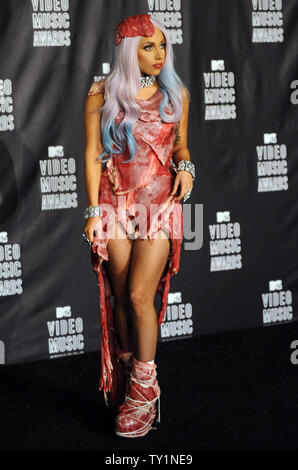 Lady Gaga appears backstage wearing a meat dress after accepting the award for video of the year for 'Bad Romance' at the MTV Video Music Awards in Los Angeles on September 12, 2010 in Los Angeles.  UPI/Jim Ruymen Stock Photo