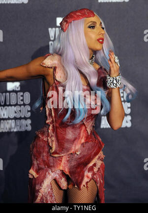 Lady Gaga appears backstage wearing a meat dress after accepting the award for video of the year for 'Bad Romance' at the MTV Video Music Awards in Los Angeles on September 12, 2010 in Los Angeles.  UPI/Jim Ruymen Stock Photo