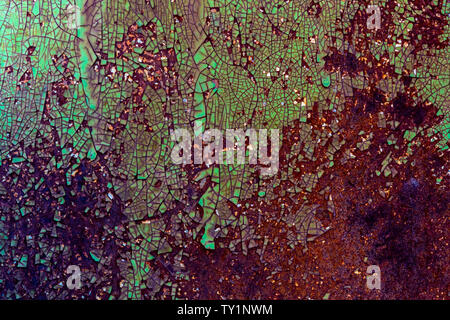 old rusty scratched stainless surface with cracked paint, abstract backgrounds Stock Photo