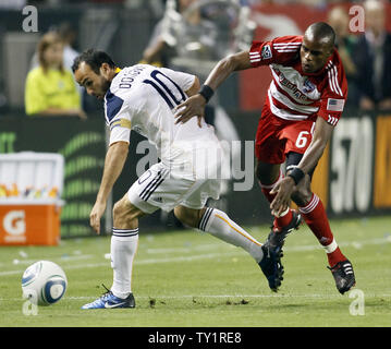 Los Angeles Galaxy forward Landon Donovan (10) and FC Dallas defender Jackson Goncalves (6) battle for the ball in the Western Conference Fiinal playoff game at the Home Depot Center in Carson, California on Nov. 14, 2010.    UPI/Lori Shepler. Stock Photo