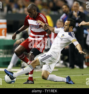 FC Dallas defender Jackson Goncalves (6) and Los Angeles Galaxy forward Landon Donovan (10) battle for the ball in the Western Conference Fiinal playoff game at the Home Depot Center in Carson, California on Nov. 14, 2010.    UPI/Lori Shepler. Stock Photo