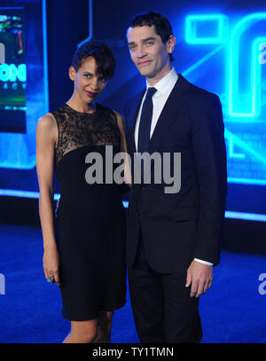 James Frain, a cast member in the motion picture sci-fi thriller 'TRON: Legacy', attends the world premiere of the film with his wife Marta Cunningham at the El Capitan Theatre in the Hollywood section of Los Angeles on December 11, 2010.  UPI/Jim Ruymen Stock Photo