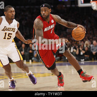 Miami Heat's LeBron James (6) drives around Los Angeles Lakers small forward Ron Artest (15) in the first half of  their NBA basketball game in Los Angeles on December  25, 2010.   UPI/Lori Shepler Stock Photo