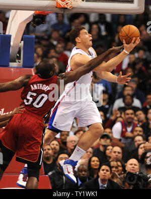 Los Angeles Clippers forward Blake Griffin is fouled on shot attempt by Miami Heat center Joel Anthony in first quarter action in Los Angeles on January 12, 2011. The Clippers defeated the Heat 111-105.  UPI/Jon SooHoo Stock Photo