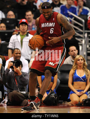 Miami Heat forward LeBron James grimaces with leg pain during  fourth quarter action against the Los Angeles Clippers in Los Angeles on January 12, 2011. The Clippers defeated the Heat 111-105.  UPI/Jon SooHoo Stock Photo
