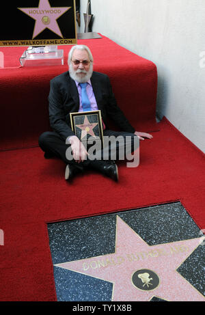 Canadian actor Donald Sutherland sits near his star during an unveiling ceremony honoring him with the 2,430th star on the Hollywood Walk of Fame in Los Angeles on January 26, 2011. Sutherland's star is set next to that of his son, actor Kiefer Sutherland.  UPI/Jim Ruymen Stock Photo