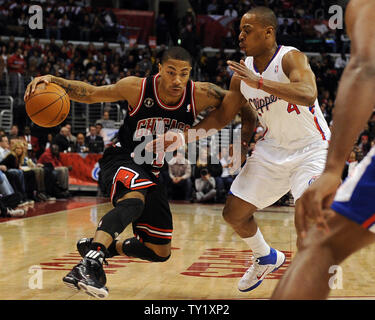 Chicago Bulls guard Derrick Rose drives to the basket against Los Angeles Clippers' guard Randy Foye during first quarter action at Staples Center February 2, 2011. The Bulls defeated the Clippers 106-88.  UPI/Jon SooHoo Stock Photo