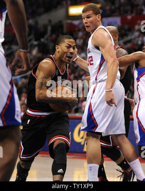 Chicago Bulls guard Derrick Rose drives to the basket past Los Angeles Clippers forward Blake Griffin during second quarter action at Staples Center February 2, 2011. The Bulls defeated the Clippers 106-88.  UPI/Jon SooHoo Stock Photo