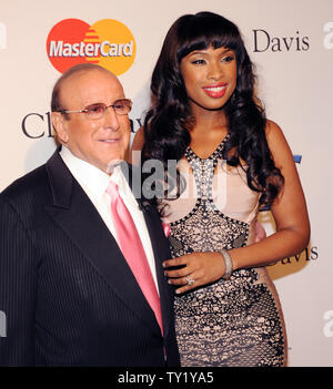 Producer Clive Davis (L) and singer/actress Jennifer Hudson arrive at the Pre-Grammy Gala & Salute to Industry Icons with Clive Davis honoring David Geffen in Beverly Hills, California on February 12, 2011.  UPI/Jim Ruymen Stock Photo