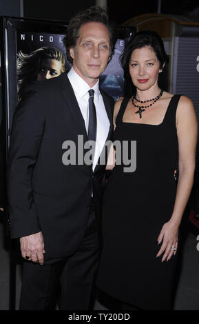 Cast member William Fichtner and wife Kymberly Kalil attend the premiere of the film 'Drive Angry' at the Arclight theater in the Hollywood section of Los Angeles on February 22, 2011.      UPI/Phil McCarten Stock Photo