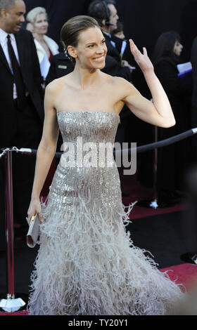 Hillary Swank arrives on the red carpet for the 83rd annual Academy