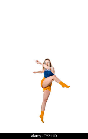 An urban woman is doing breakdance in the studio Stock Photo