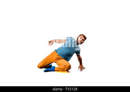 Amazing dancer is doing breakdance on a white background Stock Photo