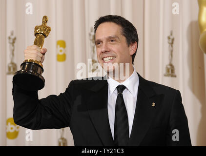 Best Animated Feature Film winner Lee Unkrich for 'Toy Story 3' poses with his Oscar at the 83rd annual Academy Awards in Hollywood on February 27, 2011. UPI/Phil McCarten Stock Photo