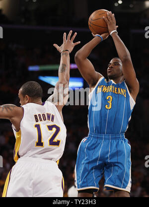 New Orleans Hornets point guard Chris Paul (3) shoots over Los Angeles Lakers point guard Shannon Brown (12) during the first half of Game 1 of their Western Conference Playoff series at Staples Center in Los Angeles on April 17, 2011. The Hornets defeated the Lakers 109 to 100  . UPI Photo/Lori Shepler Stock Photo